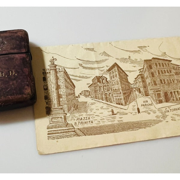 A World War II Black-Crackle Zippo with Silvio Luti Florentine Leatherwork