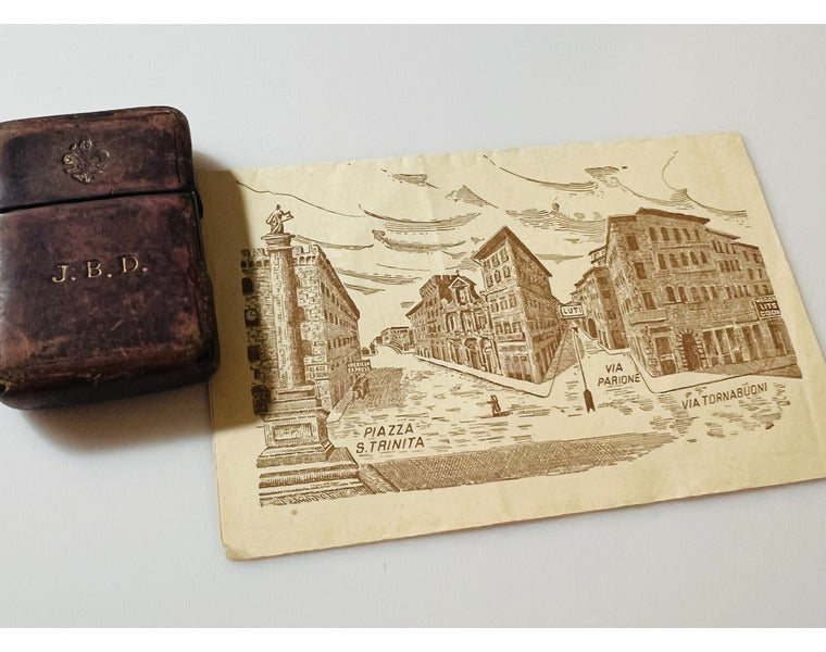 A World War II Black-Crackle Zippo with Silvio Luti Florentine Leatherwork