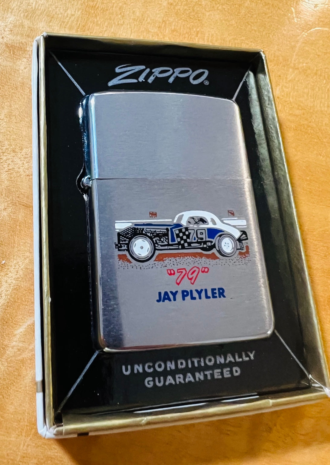 The 1968 Jay Plyler No. 79 Zippo in its period box.