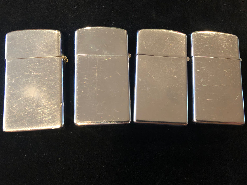 1968 Lot #47 Four Zippo Slim Lighters