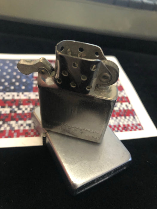 1953 “Hard Pushed” Steelie - Vintage Zippo Lighter