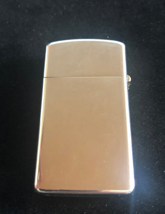 1975 High Polish Slim Zippo Lighter - Used - Very Good